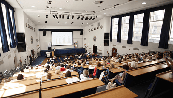 Image of people in lecture theatre attending a conference