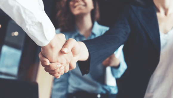 A handshake to seal the deal on a successful job interview