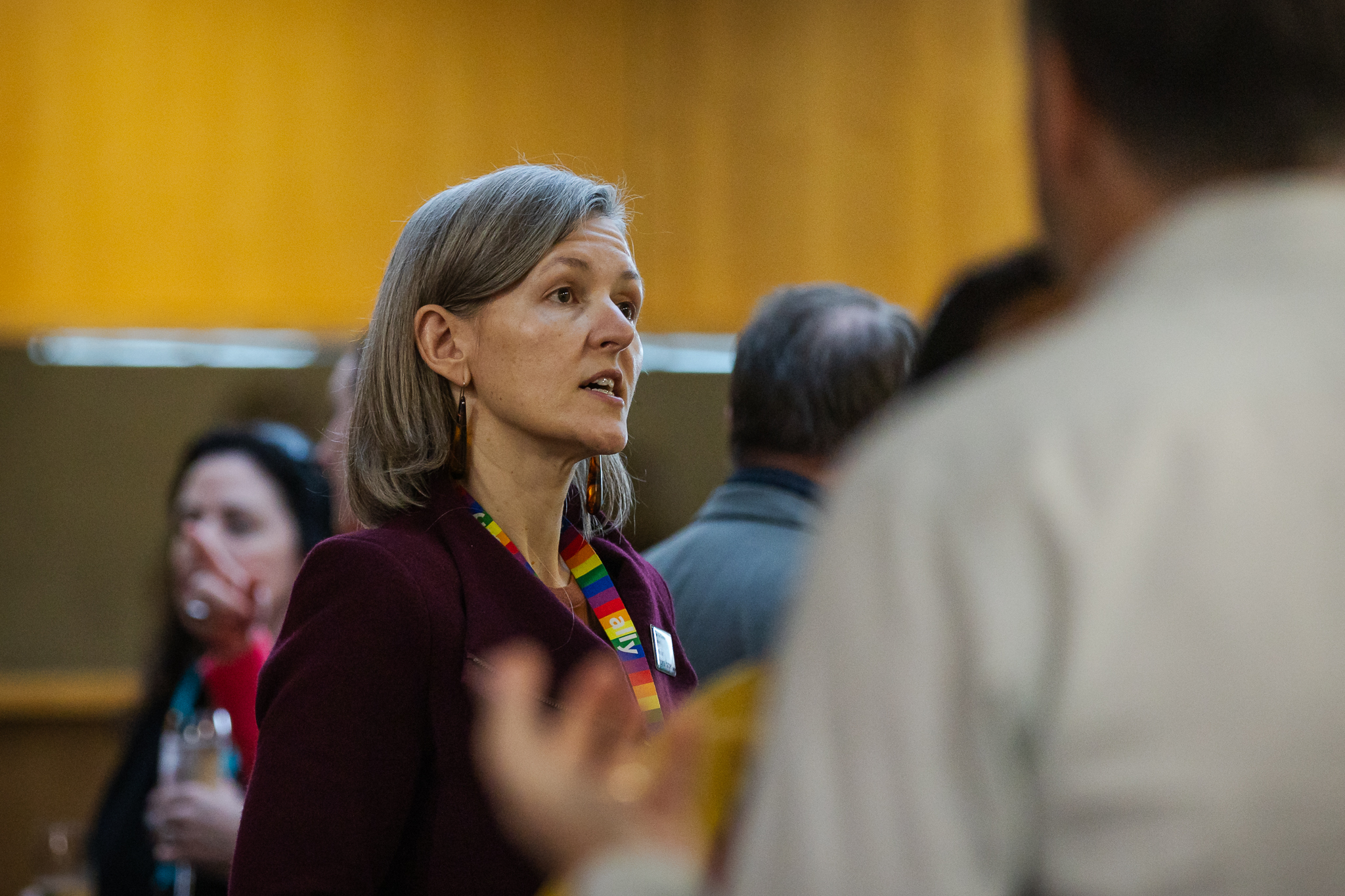 Woman speaking at informal gathering
